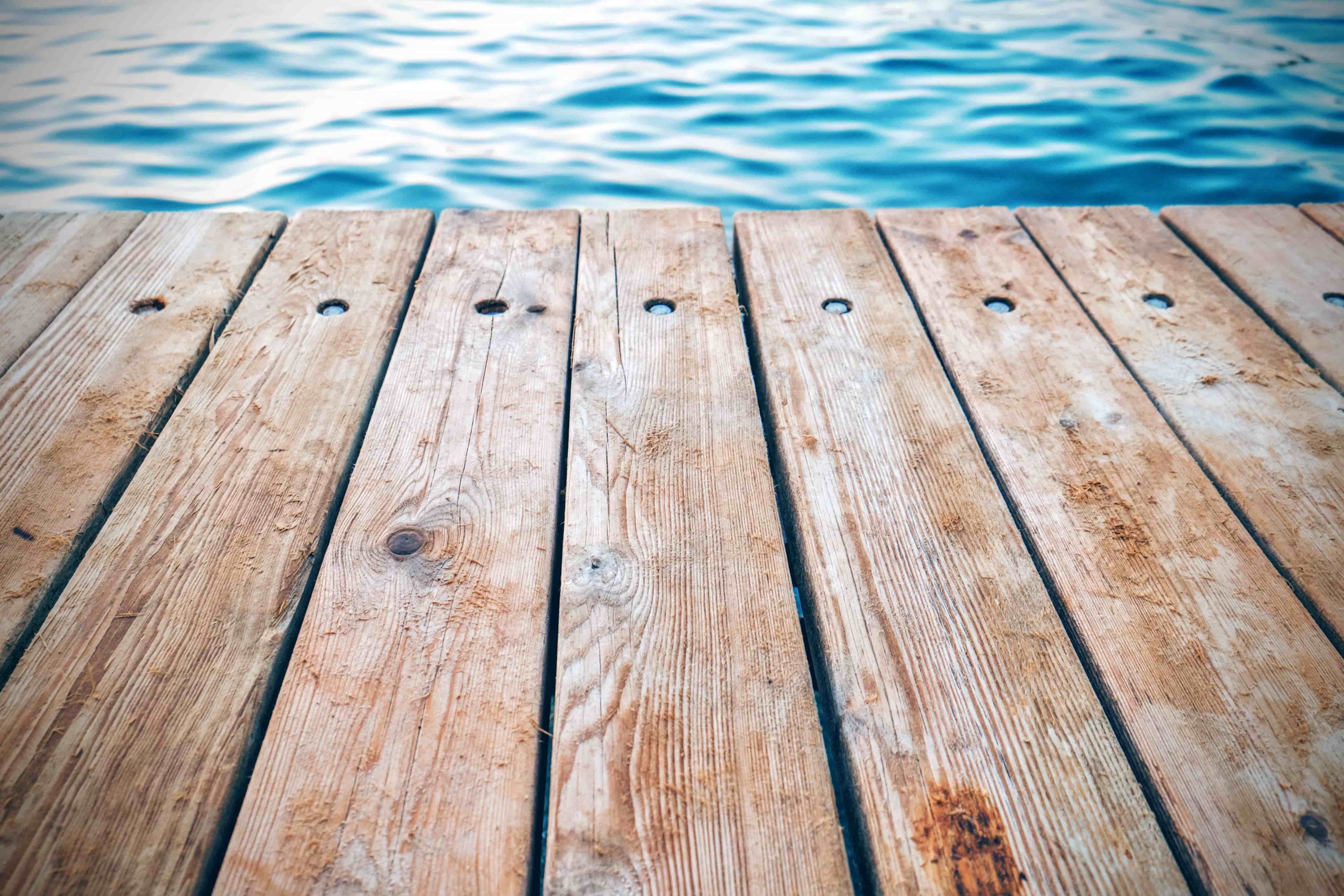 Dock decking repair in progress on a Lake Guntersville boat dock